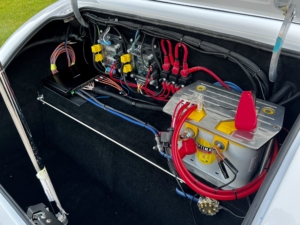 Trunk of Interior of Nick S's Factory Five Hot Rod wired with the Infinitybox system. Showing off rear POWERCELL and inMOTION Cell.