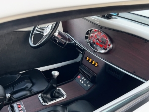 Interior of Nick S's Factory Five Hot Rod wired with the Infinitybox system.